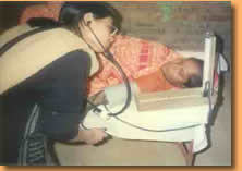 Gynaecologist examining patient