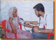 Doctor examining heart patient