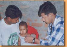 Pediatrician examining a baby